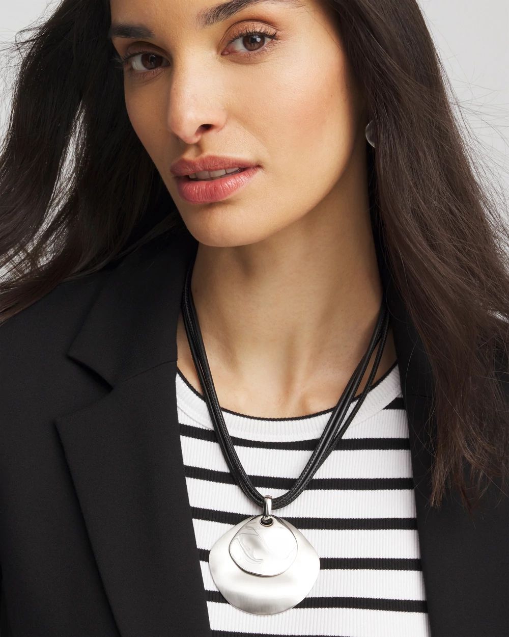 Silver Pendant On Cord