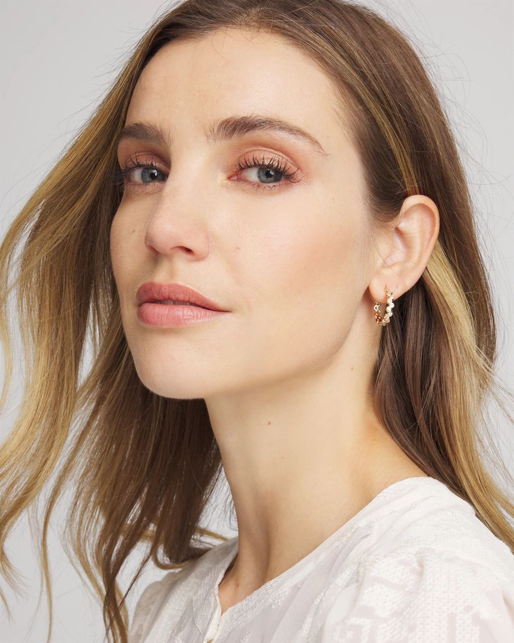 Goldtone Cubic Zirconia Hoop Earrings click to view larger image.