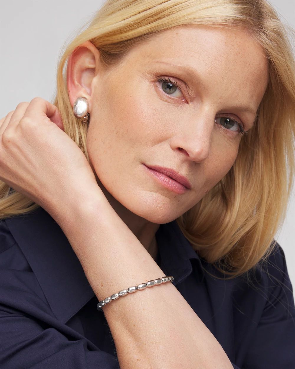 Silvertone Oval Beaded Stretch Bracelet click to view larger image.