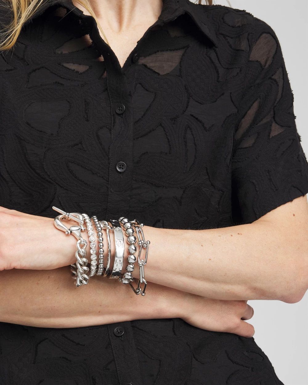 Small Beaded Silver Tone Stretch Bracelet click to view larger image.